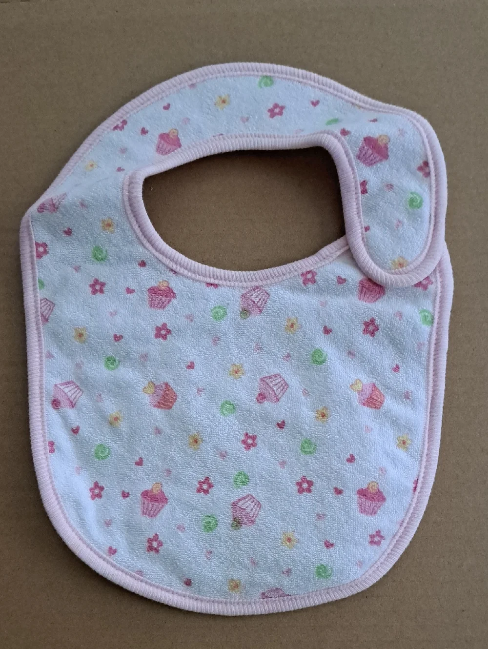 Fisher Price Soft Pink Baby Bib with Cupcake Print